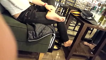 teens feet in a coffee shop