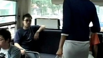 A young Asian girl enters a public bus and sits down from http://alljapanese.net